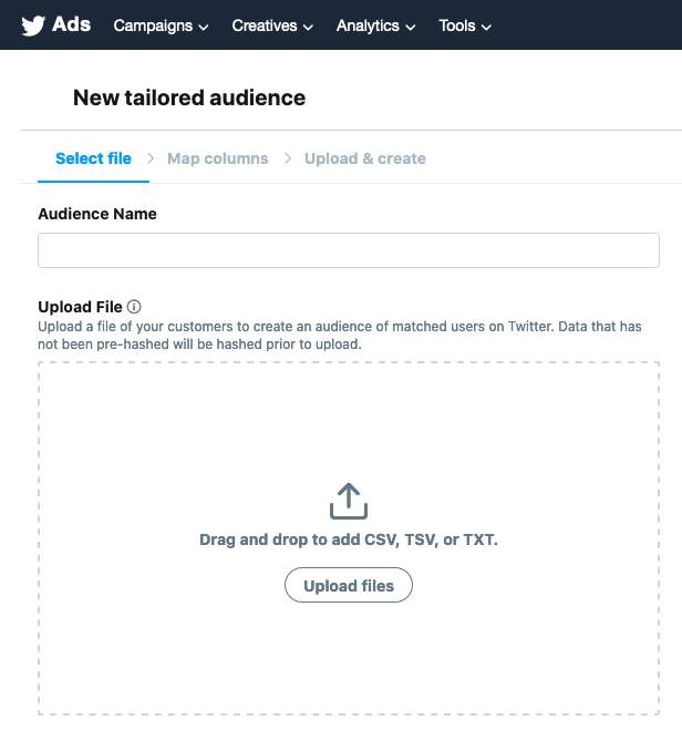 Screenshot of a Twitter page to create a new tailored audience. It shows how you can upload mailing list data via CSV or TXT to create an audience segment on social media.